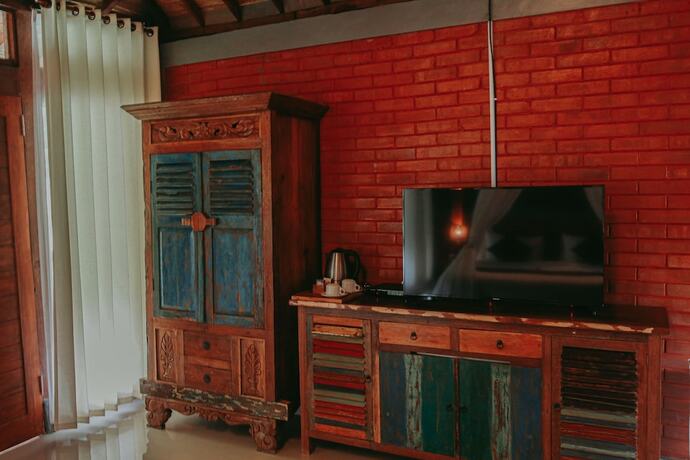 Imagen de la habitación del Hotel Keramas Sacred River Village. Foto 21