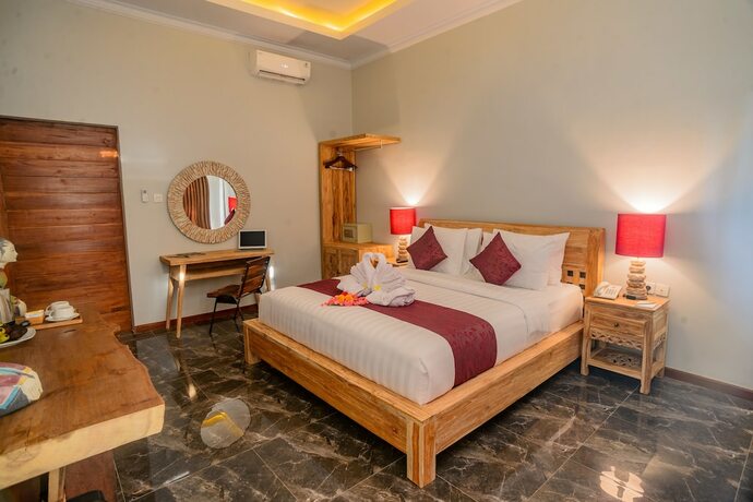 Imagen de la habitación del Hotel Keramas Sacred River Village. Foto 25