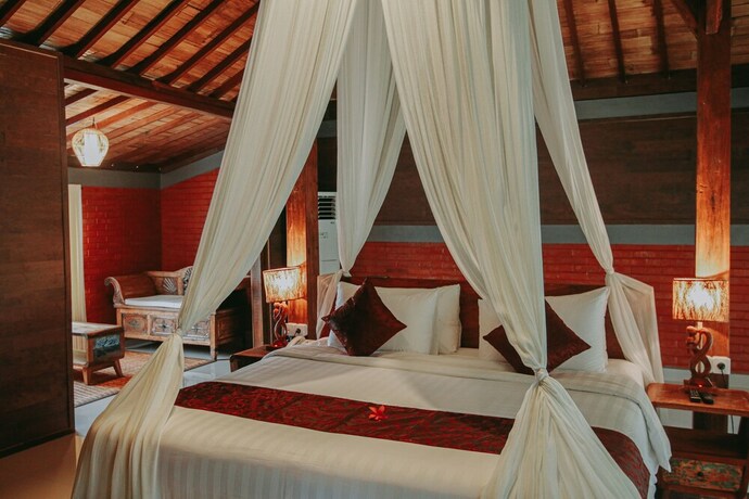 Imagen de la habitación del Hotel Keramas Sacred River Village. Foto 26