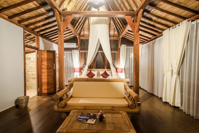 Imagen de la habitación del Hotel Keramas Sacred River Village. Foto 29