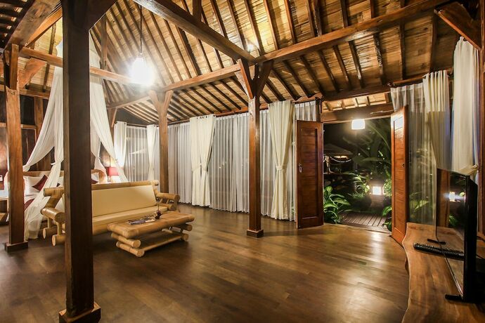 Imagen de la habitación del Hotel Keramas Sacred River Village. Foto 32