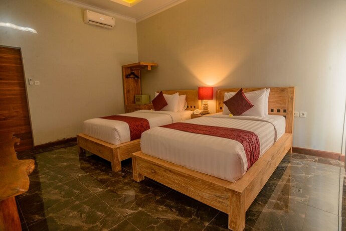 Imagen de la habitación del Hotel Keramas Sacred River Village. Foto 34