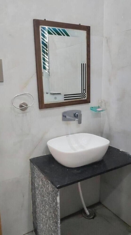 Imagen de la habitación del Hotel Kesar bagh. Foto 11