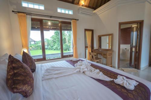 Imagen de la habitación del Hotel Ketut's Place Villas Ubud. Foto 7