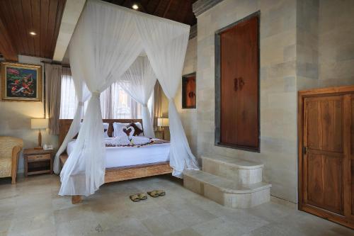 Imagen de la habitación del Hotel Ketut's Place Villas Ubud. Foto 9