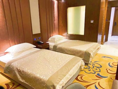 Imagen de la habitación del Hotel Kew Green Changchun. Foto 19