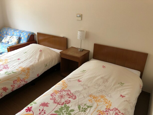 Imagen de la habitación del Hotel Key West Club Okinawa. Foto 19