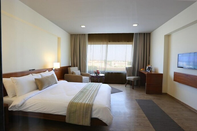 Imagen de la habitación del Hotel Keys Prima Temple Tree, Shirdi. Foto 8