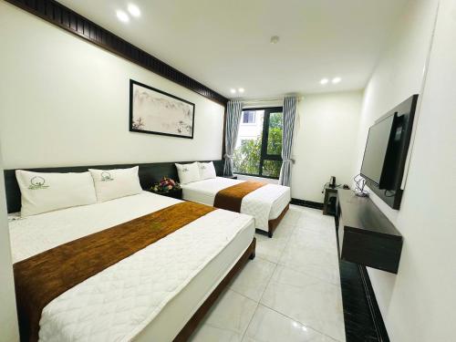 Imagen de la habitación del Hotel Kh&aacute;ch Sạn Ch&acirc;u Long FLC Sầm Sơn. Foto 14