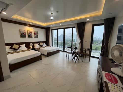 Imagen de la habitación del Hotel Kh&aacute;ch Sạn Moonlight FLC Sầm Sơn. Foto 9