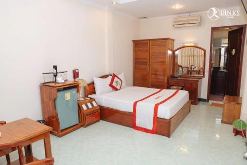 Imagen de la habitación del Hotel Kh&aacute;ch sạn D&igrave;n K&yacute; Cổng Ch&agrave;o B&igrave;nh Dương. Foto 17
