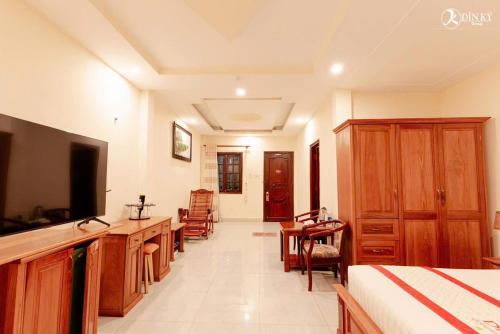 Imagen de la habitación del Hotel Kh&aacute;ch sạn D&igrave;n K&yacute; Cổng Ch&agrave;o B&igrave;nh Dương. Foto 18