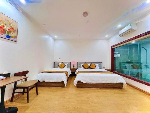 Imagen de la habitación del Hotel Kh&aacute;ch sạn Hoa Mỹ 华美酒店. Foto 17