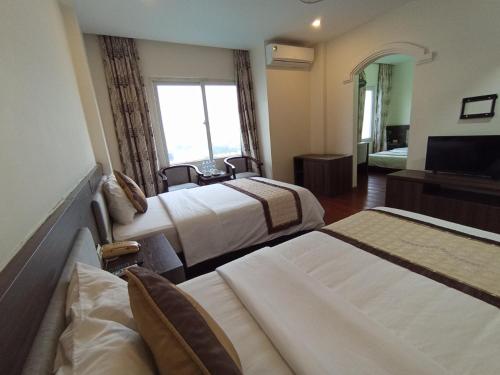 Imagen de la habitación del Hotel Kh&aacute;ch sạn Hữu Nghị. Foto 19
