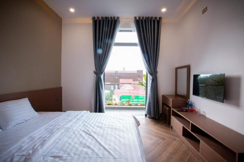 Imagen de la habitación del Hotel Kh&aacute;ch sạn Mimosa. Foto 13