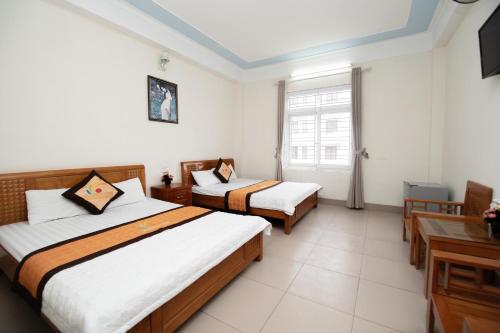 Imagen de la habitación del Hotel Kh&aacute;ch sạn T&acirc;n Trường Sơn. Foto 18