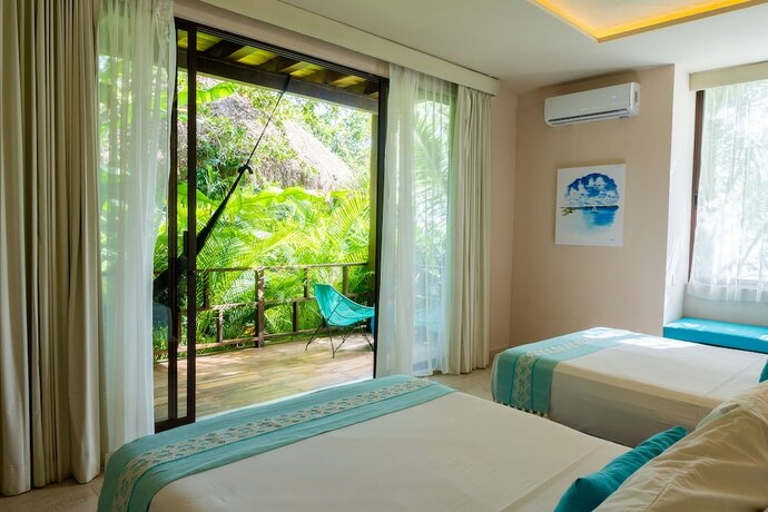 Imagen de la habitación del Hotel Khaban Bacalar Boutique. Foto 11