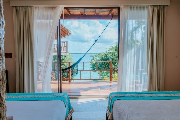 Imagen de la habitación del Hotel Khaban Bacalar Boutique. Foto 12