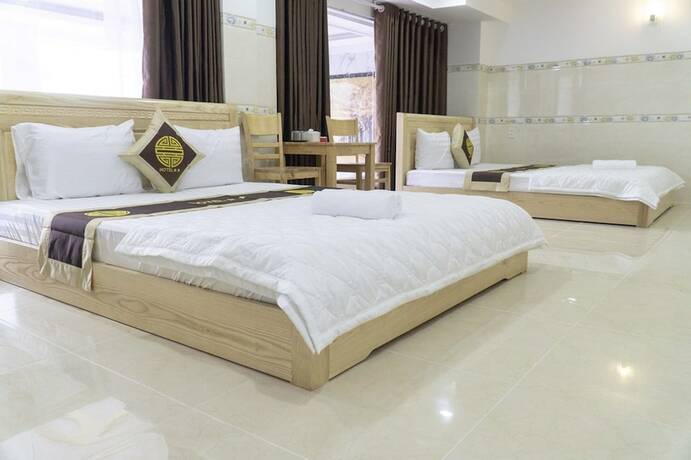 Imagen de la habitación del Hotel Khach San Dai An Binh Tan. Foto 15