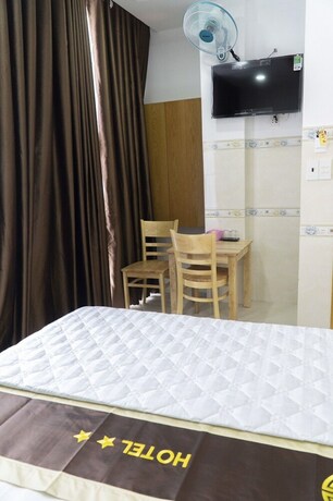 Imagen de la habitación del Hotel Khach San Dai An Binh Tan. Foto 25