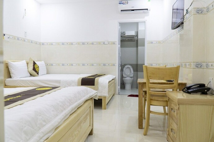 Imagen de la habitación del Hotel Khach San Dai An Binh Tan. Foto 28