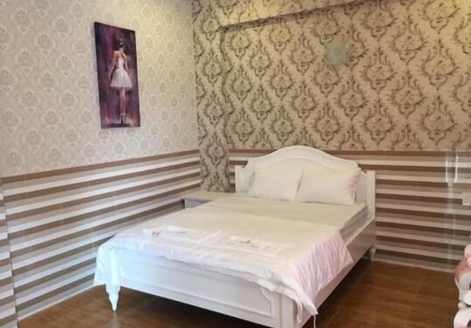 Imagen de la habitación del Hotel Khach San Dong Phuong. Foto 6