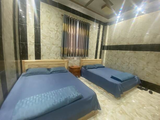 Imagen de la habitación del Hotel Khach San Hoi Nghia. Foto 19