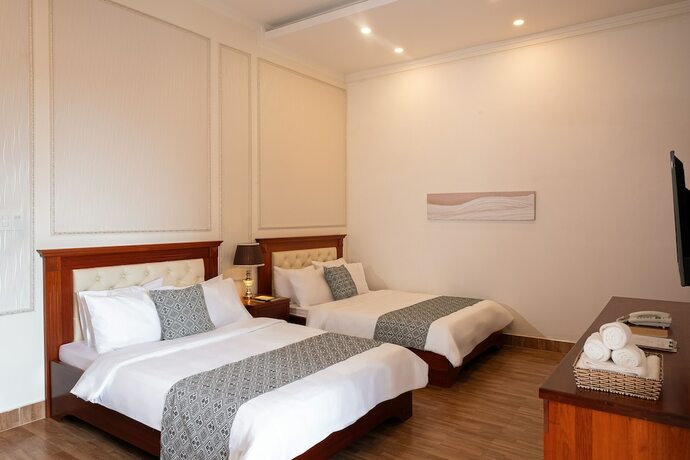 Imagen de la habitación del Hotel Khach San Mekong Gia Lai. Foto 27