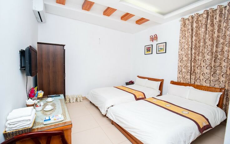 Imagen de la habitación del Hotel Khach San Phuong Dong. Foto 22