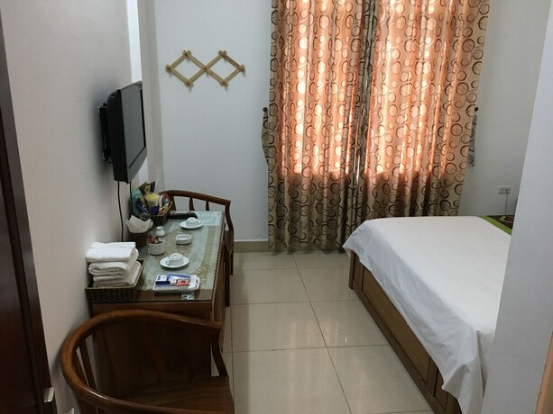 Imagen de la habitación del Hotel Khach San Phuong Dong. Foto 23