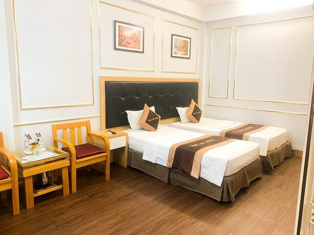 Imagen de la habitación del Hotel Khach San Viet My. Foto 17