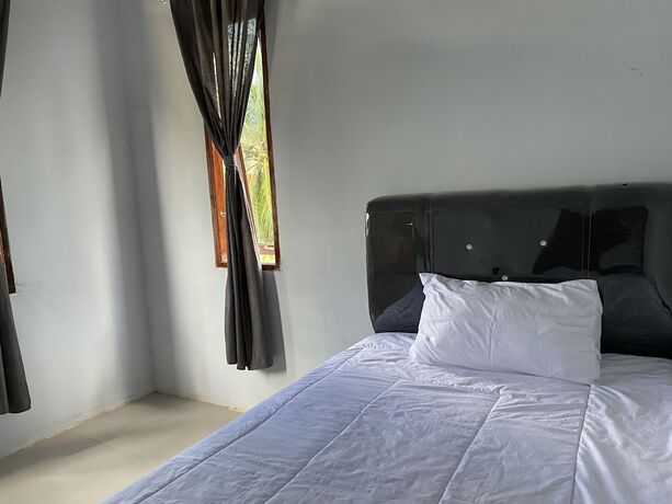 Imagen de la habitación del Hotel Khalisa Home Syariah Pontianak. Foto 16
