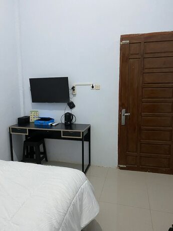 Imagen de la habitación del Hotel Khalisa Home Syariah Pontianak. Foto 17