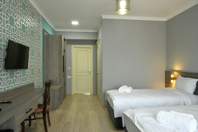Imagen de la habitación del Hotel Khan Samarkand, Samarkand. Foto 14