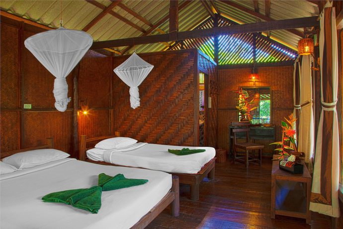 Imagen de la habitación del Hotel Khao Sok Riverside Cottage. Foto 9