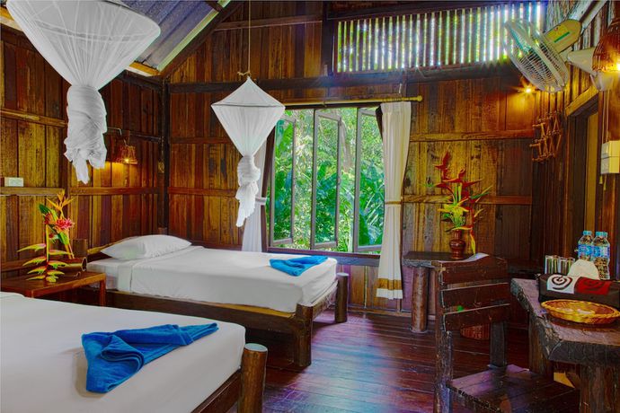 Imagen de la habitación del Hotel Khao Sok Riverside Cottage. Foto 16