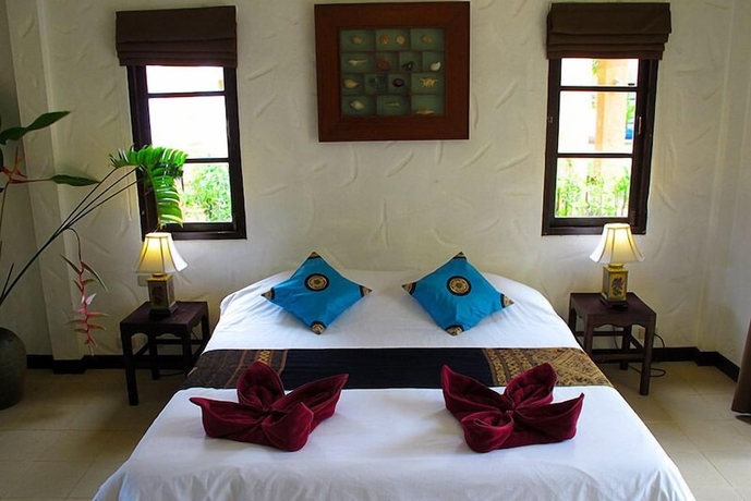 Imagen de la habitación del Hotel Khaolak Palm Hill Resort. Foto 9