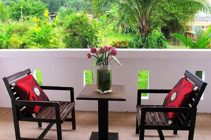 Imagen de la habitación del Hotel Khaolak Palm Hill Resort. Foto 13