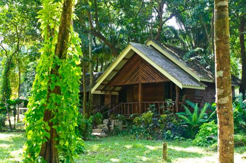 Imagen de la habitación del Hotel Khaosok Riverside Cottages. Foto 12