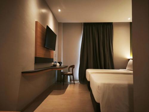 Imagen de la habitación del Hotel Khas Palu. Foto 12