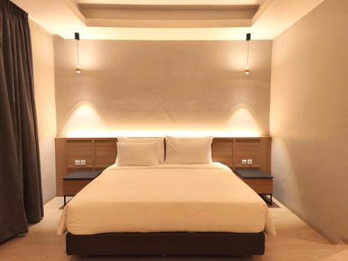 Imagen de la habitación del Hotel Khas Palu. Foto 14