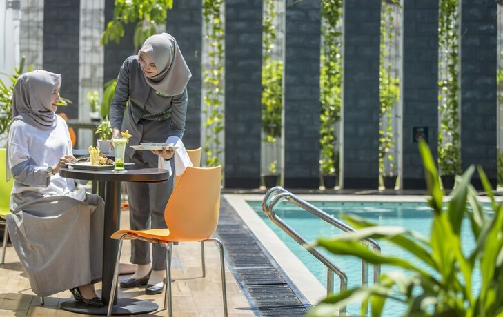 Imagen de la piscina del Hotel Khas Pekalongan. Foto 30