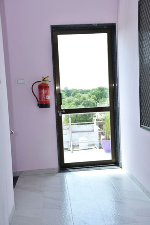 Imagen de la habitación del Hotel Khatushyamji. Foto 12