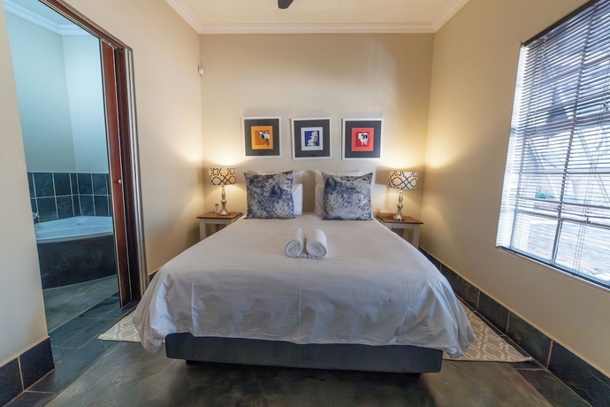 Imagen de la habitación del Hotel Khayamanzi Guesthouse. Foto 4