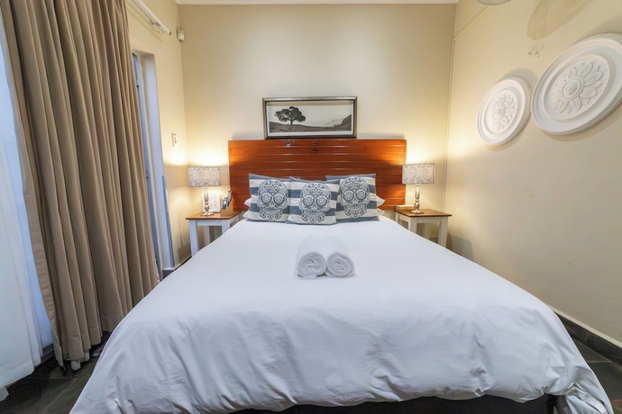 Imagen de la habitación del Hotel Khayamanzi Guesthouse. Foto 8