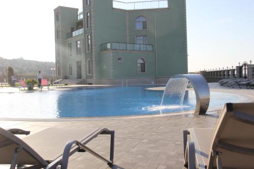 Imagen de la piscina del Hotel Khazar Inji. Foto 8