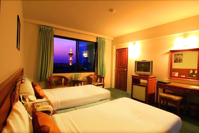 Imagen de la habitación del Hotel Khumsuphan Hotel. Foto 5