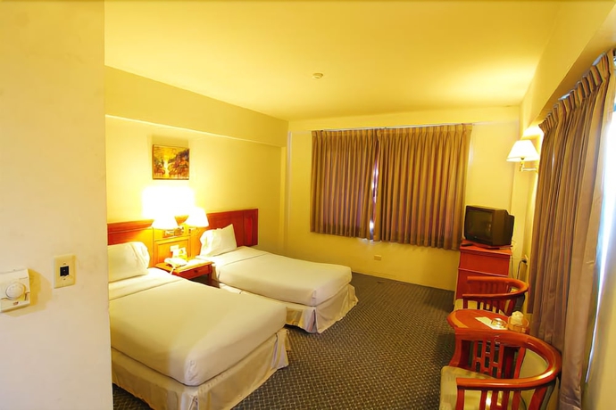 Imagen de la habitación del Hotel Khumsuphan Hotel. Foto 9