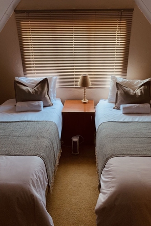 Imagen de la habitación del Hotel Khutsong Lodge. Foto 8