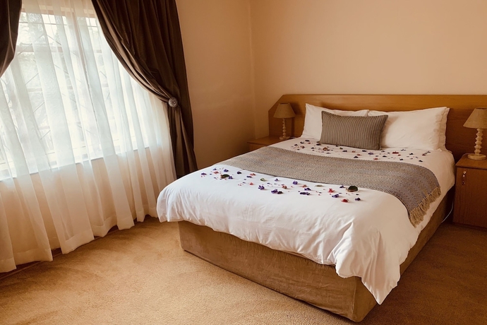 Imagen de la habitación del Hotel Khutsong Lodge. Foto 9